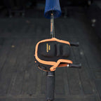 Black and orange baitcaster fishing reel protecting case